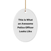 This Is What An Awesome Police Officer Looks Like, Gifts for Police Officers, Oval Ornament, Christmas Unique Gifts from Friends and Family - Image 1